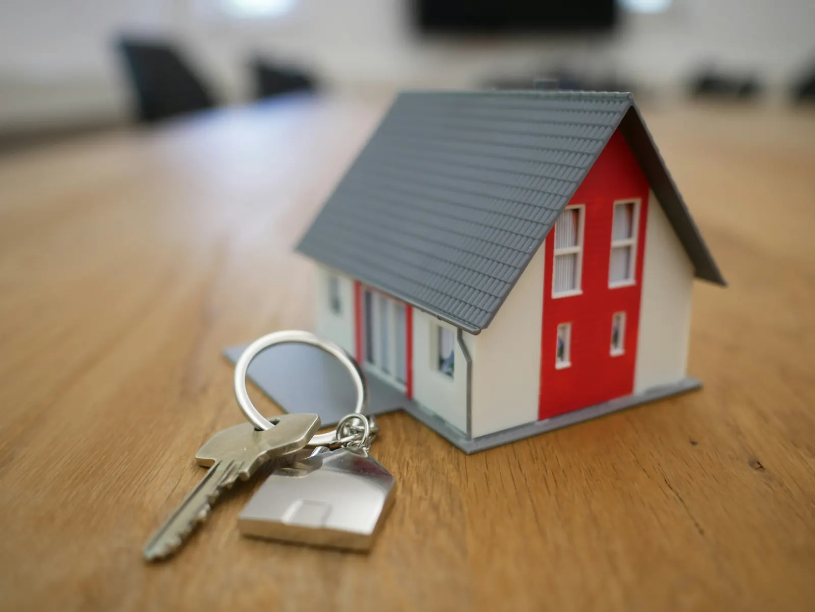 Model house with keys on a table